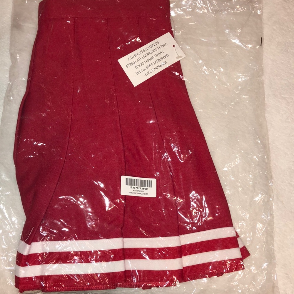Red pleated cheer skirt